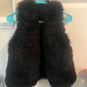 Black faux fur vest size small.